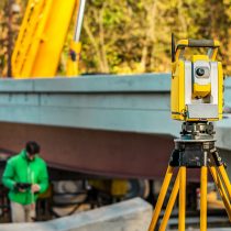Surveyor,Engineer,With,Equipment,(theodolite,Or,Total,Positioning,Station),On